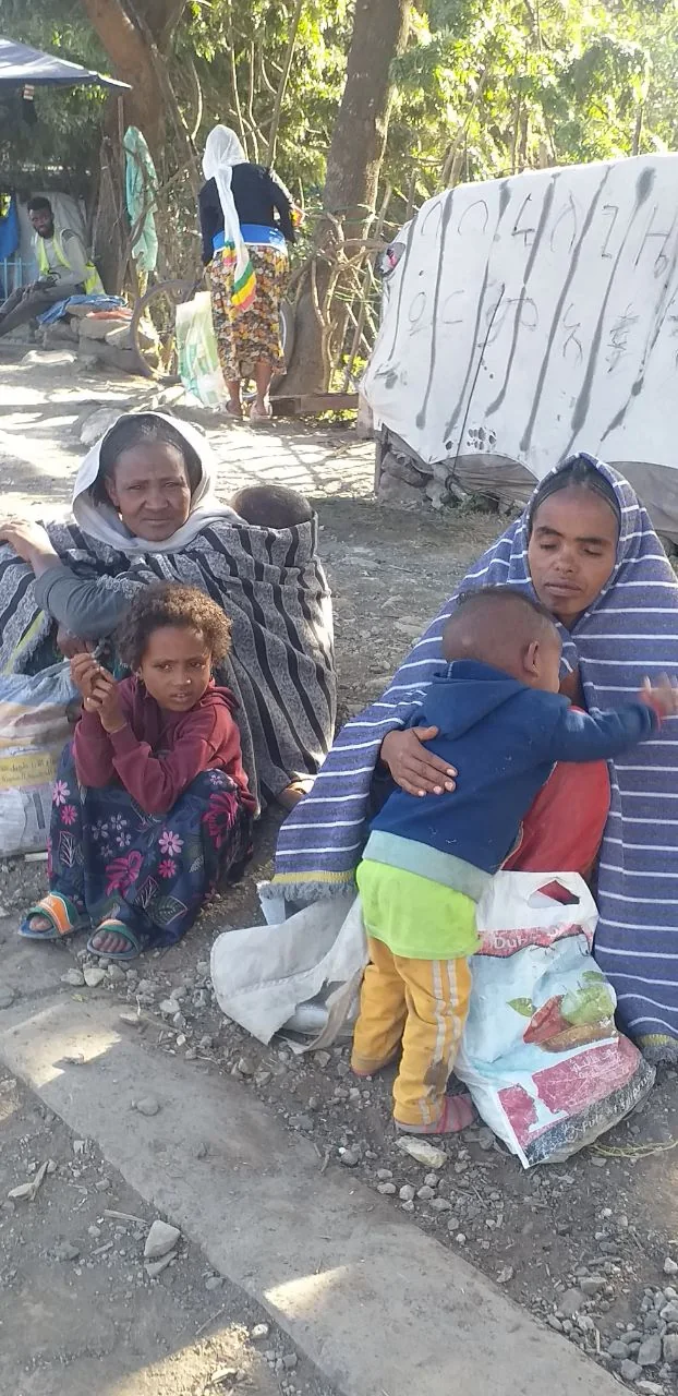 Mothers and children gathered in the community